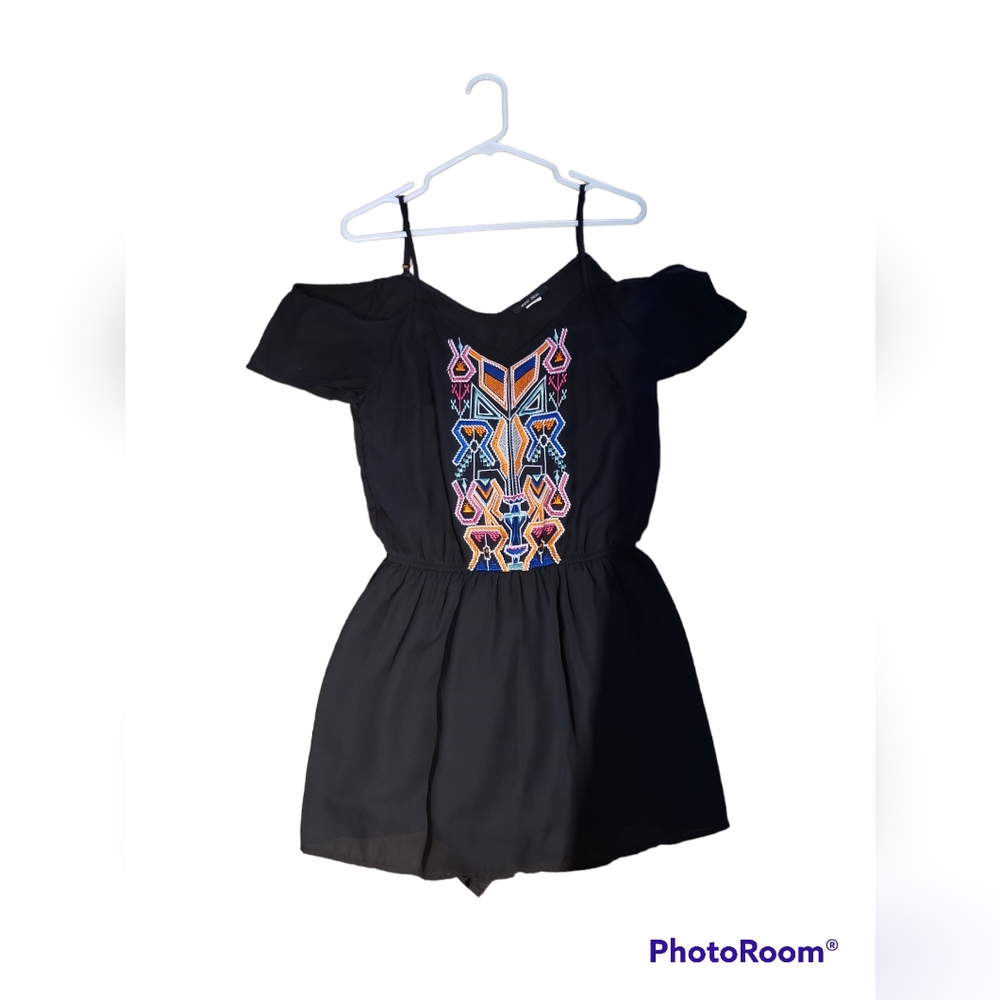 Black Romper With Pattern On Front